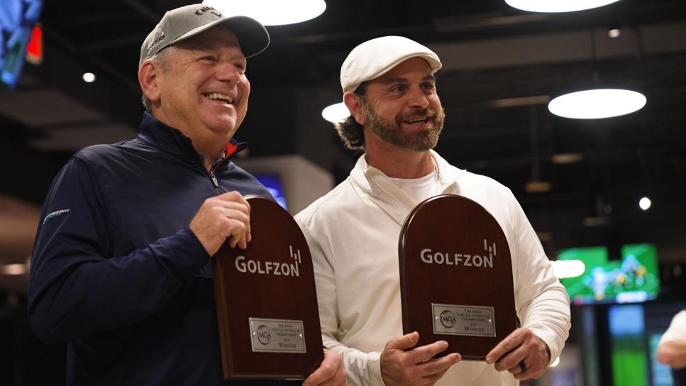 /content/dam/images/golfdigest/fullset/2023/12/golfzon-winners-with-trophy.jpg